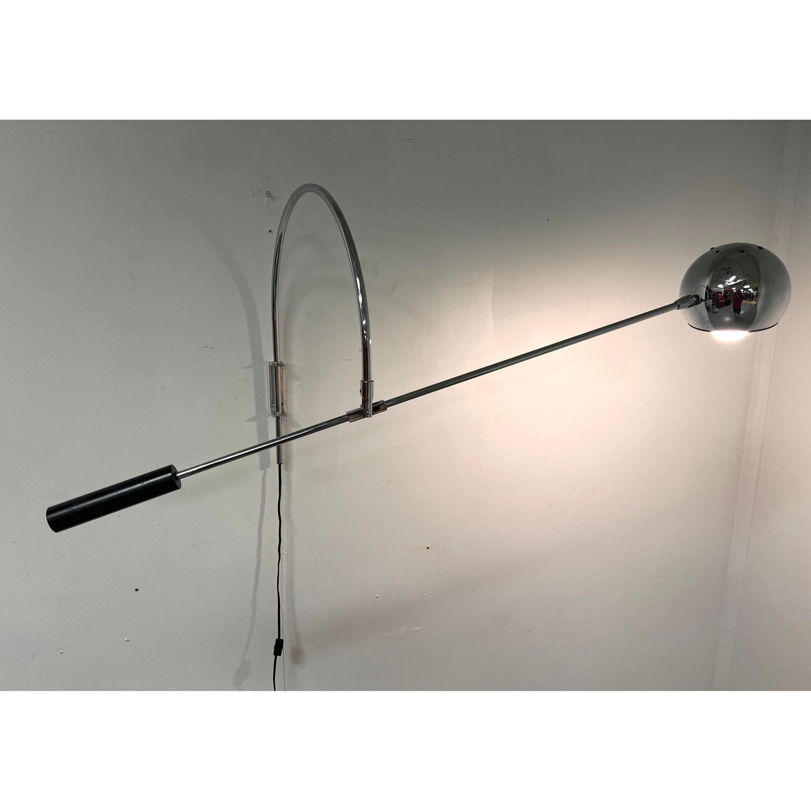 ROBERT SONNEMAN Chrome Arm Wall Lamp. Arched arm supports cantilever arm with large chrome ball shad: ROBERT SONNEMAN Chrome Arm Wall Lamp. Arched arm supports cantilever arm with large chrome ball shade. Modernist Lighting. Labeled. Dimensions: H: 20 inches: W: 40.5 inches ---