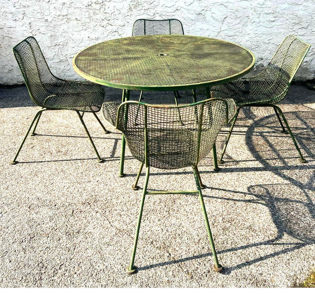 RUSSELL WOODARD Outdoor Mesh Dining Set. 4 Chairs Round Diamond Screen Dining Table. Two Arm and Two: RUSSELL WOODARD Outdoor Mesh Dining Set. 4 Chairs Round Diamond Screen Dining Table. Two Arm and Two Side Chairs. Paint finish. Dimensions: H: 29 inches: W: 47.5 inches: D: 47.5 inches ---