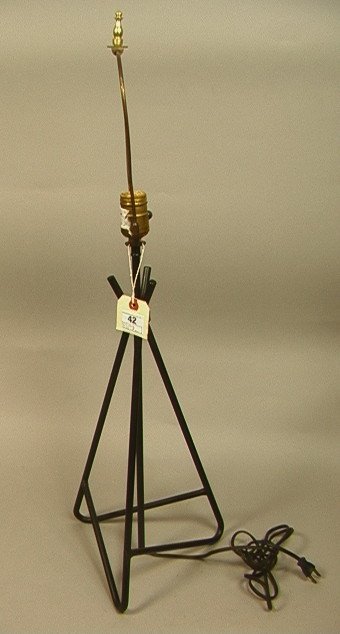 JEAN ROYERE style Iron Hairpin Table Lamp. Tripod: JEAN ROYERE style Iron Hairpin Table Lamp. Tripod Black Iron with Corseted Waist. Unmarked.-- Dimensions: H: 31 inches: W: 10 inches: D: 8.5 inches ---