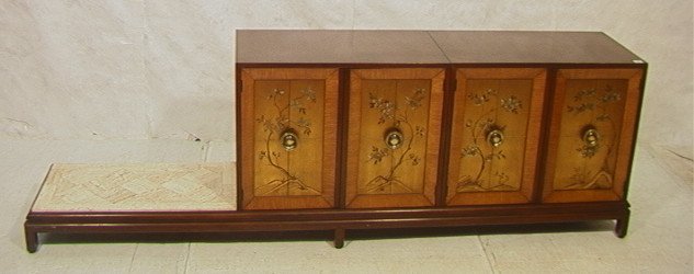 RENZO RUTILI Long Asian Credenza Cabinet. Four do: RENZO RUTILI Long Asian Credenza Cabinet. Four door Cabinet on long base with travertine tile section. Each door has beveled wood frame around gilt painted Asian panel. Antiqued brass caps on legs.-- 