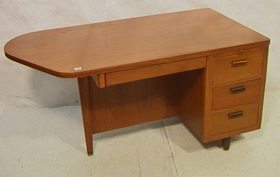 American Modern Art Deco Walnut Desk. Shaped top.: American Modern Art Deco Walnut Desk. Shaped top. Five drawers. Metal pulls.-- Dimensions: H: 29 inches: W: 58 inches: D: 30 inches ---