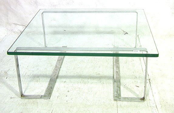 70's Modern Coffee Cocktail Table. Wide flat chr: 70's Modern Coffee Cocktail Table. Wide flat chrome with .75 in thick glass top. Unmarked.-- Dimensions: H: 13 inches: W: 32 inches ---