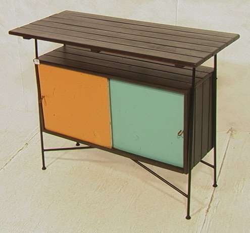 ARTHUR UMANOFF Sliding Door Cabinet. Iron & Wood: ARTHUR UMANOFF Sliding Door Cabinet. Iron & Wood Construction. Sliding Colored Doors under Suspended Top. Black Iron Legs-- Dimensions: H: 32.25 inches: W: 42 inches: D: 18 inches ---