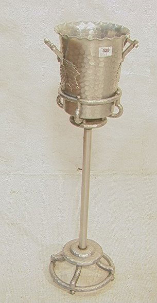 EVERLAST Aluminum Ice Bucket on Stand. Hard to fi: EVERLAST Aluminum Ice Bucket on Stand. Hard to find the set. Grape motif on the ice bucket. Marked.-- Dimensions: H: 34 inches: W: 9 inches ---