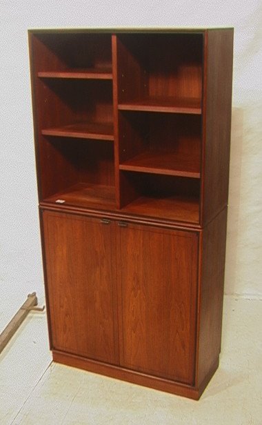 2 PC American Modern Walnut Bookcase Cabinet. Lea: 2 PC American Modern Walnut Bookcase Cabinet. Leather strap handles. Cabinet with interior shelves. -- Dimensions: H: 67.5 inches: W: 32.5 inches: D: 14 inches ---