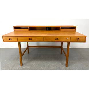 Peter Lovig Nielsen Teak Danish Modern Flip Top Desk marked Lovig Dansk Designs Denmark: Peter Lovig Nielsen Teak Danish Modern Flip Top Desk marked Lovig Dansk Designs Denmark Includes: 1 - 9 inch leaf. Dimensions: Frame Height: 29 inches, Frame Width: 64 inches, Depth: 29 inches. 