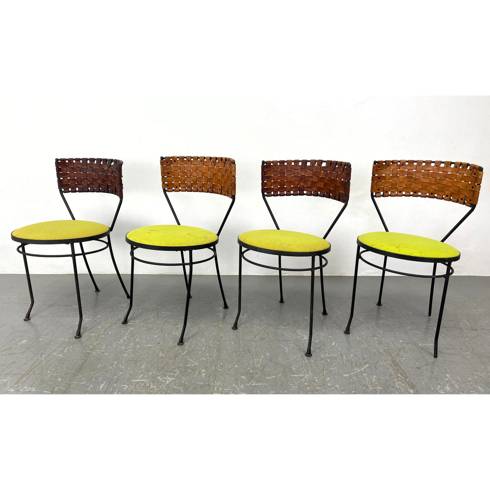 Set 4 Arthur Umanoff wrought iron dining chairs with woven leather backs for Shaver Howard.  Paper l (1 of 15)