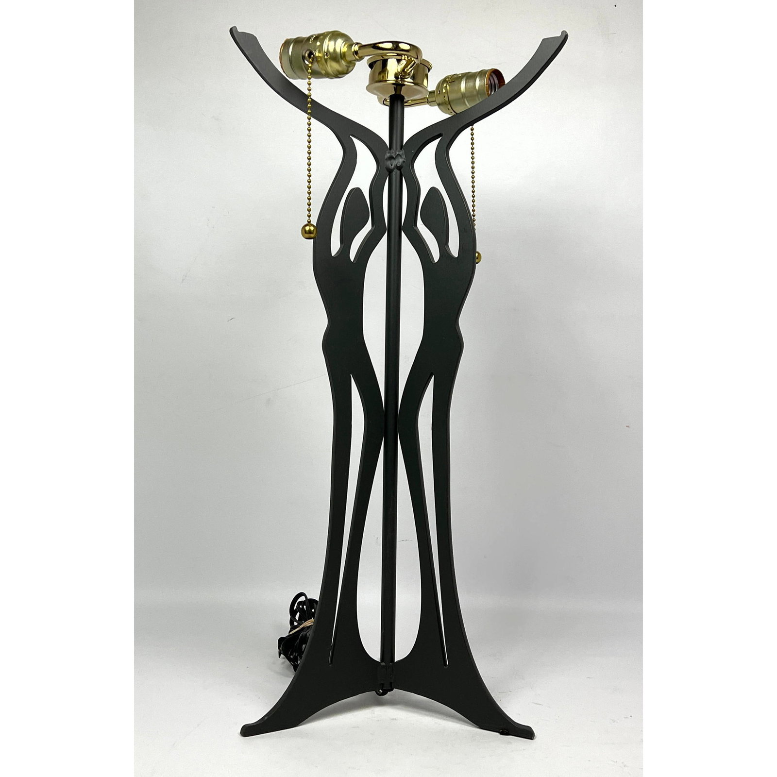 Stylish Steel figural silhouette lamp.: Stylish Steel figural silhouette lamp. Dimensions: Height: 22 inches, Width: 10 inches, Depth: 10 inches. --- US Packing and Shipping charge: In house shipping available. Will be calculated once desti