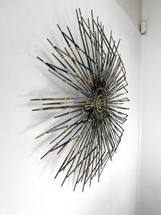 Brutalist Nail Wall Sculpture. Wonderful Modernist Form. 3 Dimensional Starburst has angled joints t: Brutalist Nail Wall Sculpture. Wonderful Modernist Form. 3 Dimensional Starburst has angled joints to create depth and drama. Signed. Dimensions: Height: 42 inches, Width: 42 inches, Depth: 4 inches.