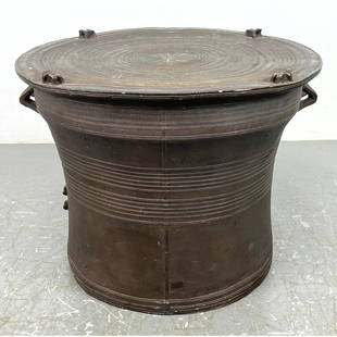 Southeast Asian Rain Drum style Table. Resin form with relief design.: Southeast Asian Rain Drum style Table. Resin form with relief design. Dimensions: Height: 18.5 inches, Width: 24.5 inches, Depth: 24.5 inches. ---