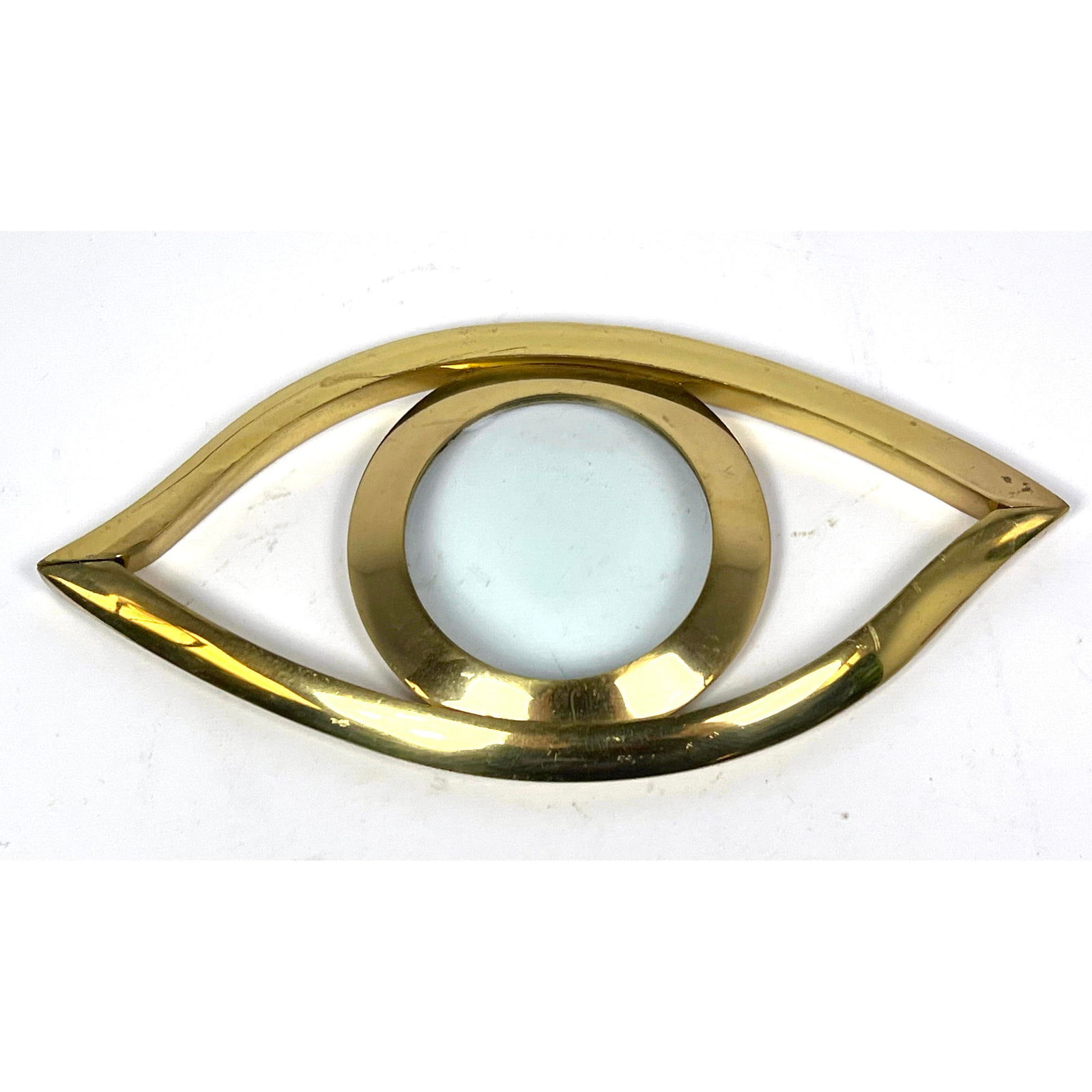 Hermes Style Brass Eyeball Glass Magnifier: Hermes Style Brass Eyeball Glass Magnifier Dimensions: Height: 5.25 inches, Width: 11 inches, Depth: 1 inches. --- US Packing and Shipping charge: In house shipping available. Will be calculated once