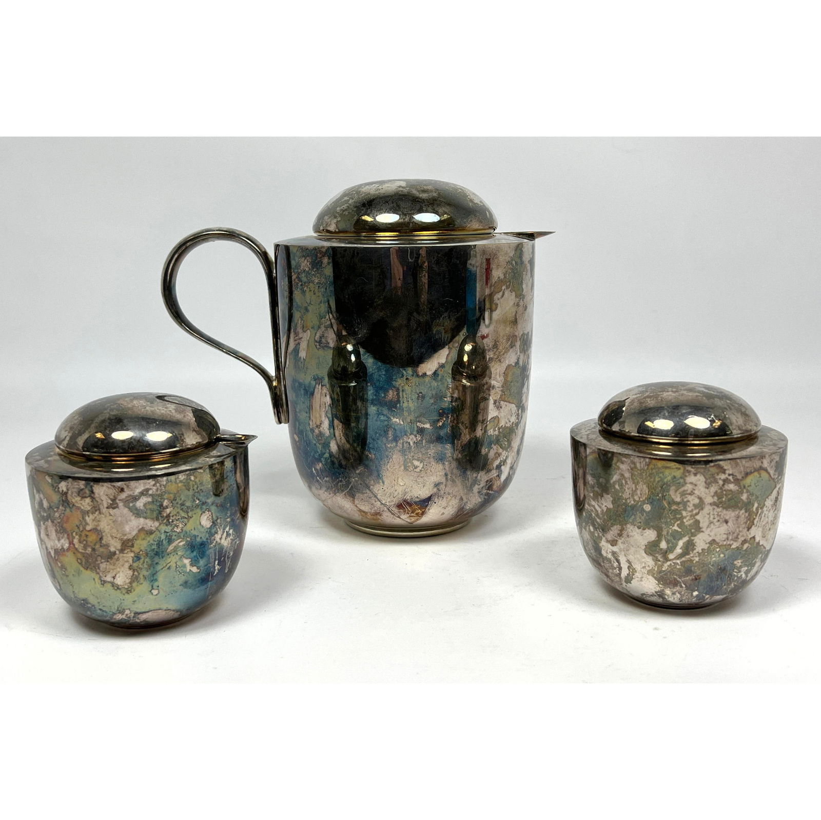 3pc Vivanna TORUN for DANSK Designs Tea Set. B?low-Hube Danish Modern Silver Plated Tea Pot. Cream a: 3pc Vivanna TORUN for DANSK Designs Tea Set. B?low-Hube Danish Modern Silver Plated Tea Pot. Cream and Sugar. Marked Dimensions: Height: 7 inches, Width: 8 inches, Depth: 5.25 inches. --- US Packing a