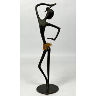 Signed Hagenauer Nubian Dancer Austrian Bronze with Original Grass Skirt. CARL HAGENAUER: Signed Hagenauer Nubian Dancer Austrian Bronze with Original Grass Skirt. CARL HAGENAUER Dimensions: Height: 8 inches, Width: 2 inches, Depth: 2 inches. --- US Packing and Shipping charge: $35 Plus in