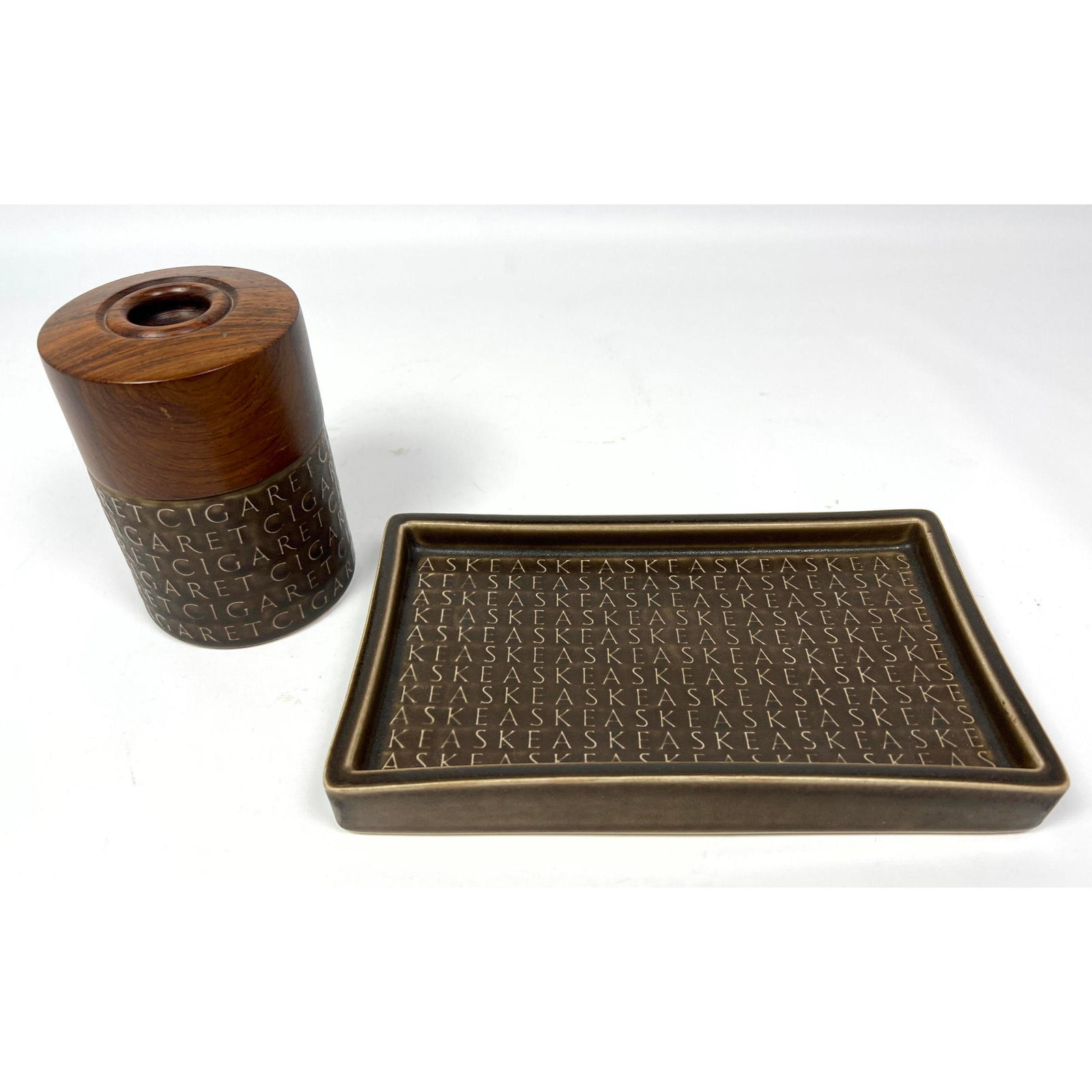 2pc KRONJYDEN Porcelain Teak Trim Smoking Set. Cigarette Lidded Jar and Tray. Danish Modern Design.: 2pc KRONJYDEN Porcelain Teak Trim Smoking Set. Cigarette Lidded Jar and Tray. Danish Modern Design. Marked. Dimensions: Height: 5 inches, Width: 3.5 inches, Depth: 3.5 inches. - Additional Dimensions: