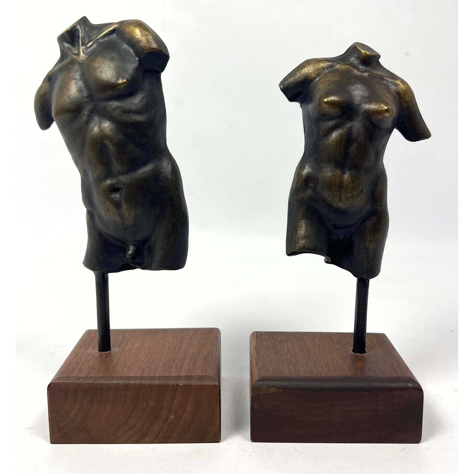 Bronze Nelles 1981 torso sculptures on walnut bases. Signature on reverse. Nude torso.: Bronze Nelles 1981 torso sculptures on walnut bases. Signature on reverse. Nude torso. Dimensions: Height: 9 inches, Width: 3.5 inches, Depth: 3 inches. ---