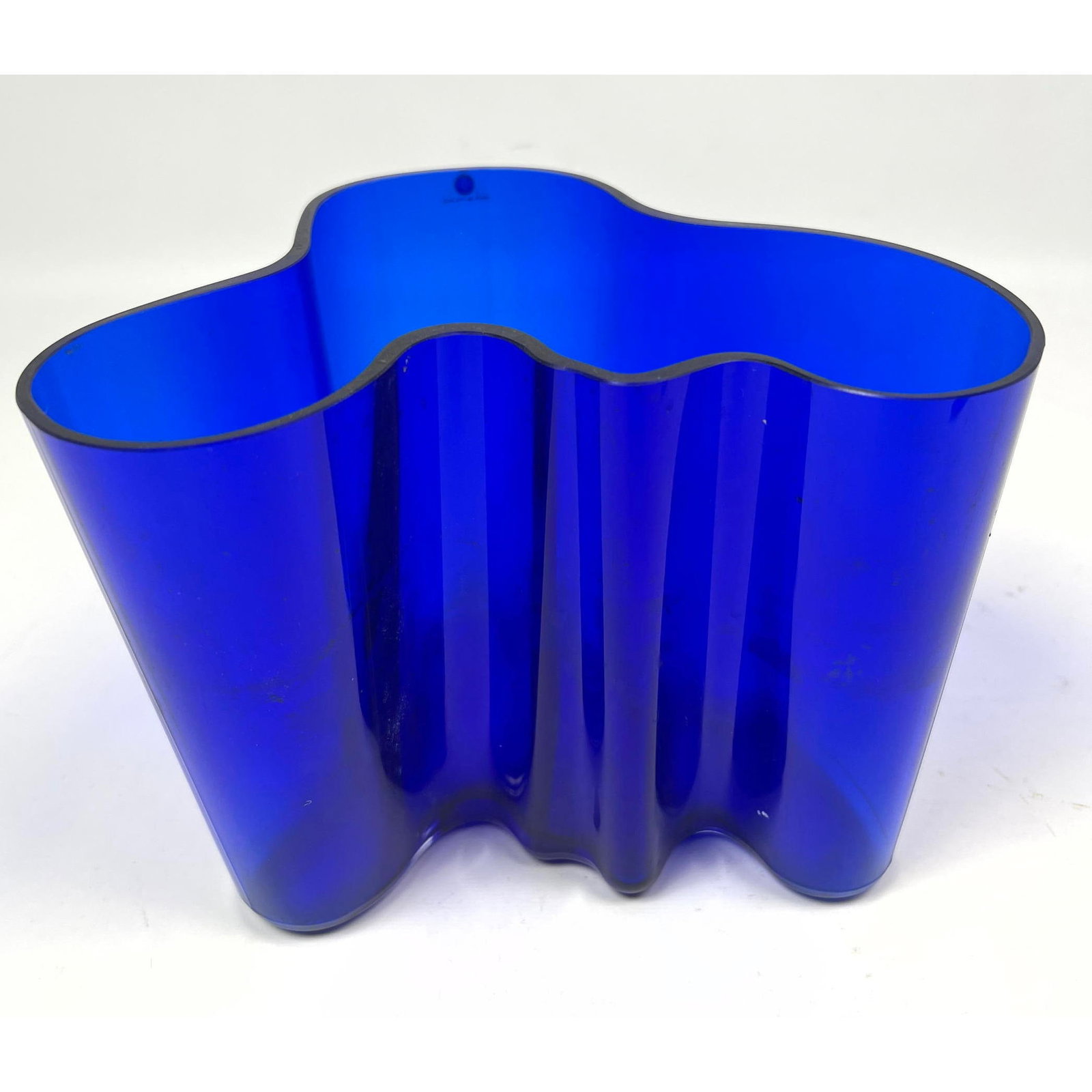 Alvar Aalto Iittala Cobalt Blue Savoy Glass Vase. Label. Signed and dated 1991.: Alvar Aalto Iittala Cobalt Blue Savoy Glass Vase. Label. Signed and dated 1991. Dimensions: Height: 6.25 inches, Width: 8 inches, Depth: 6.25 inches. --- US Packing and Shipping charge: In house shipp