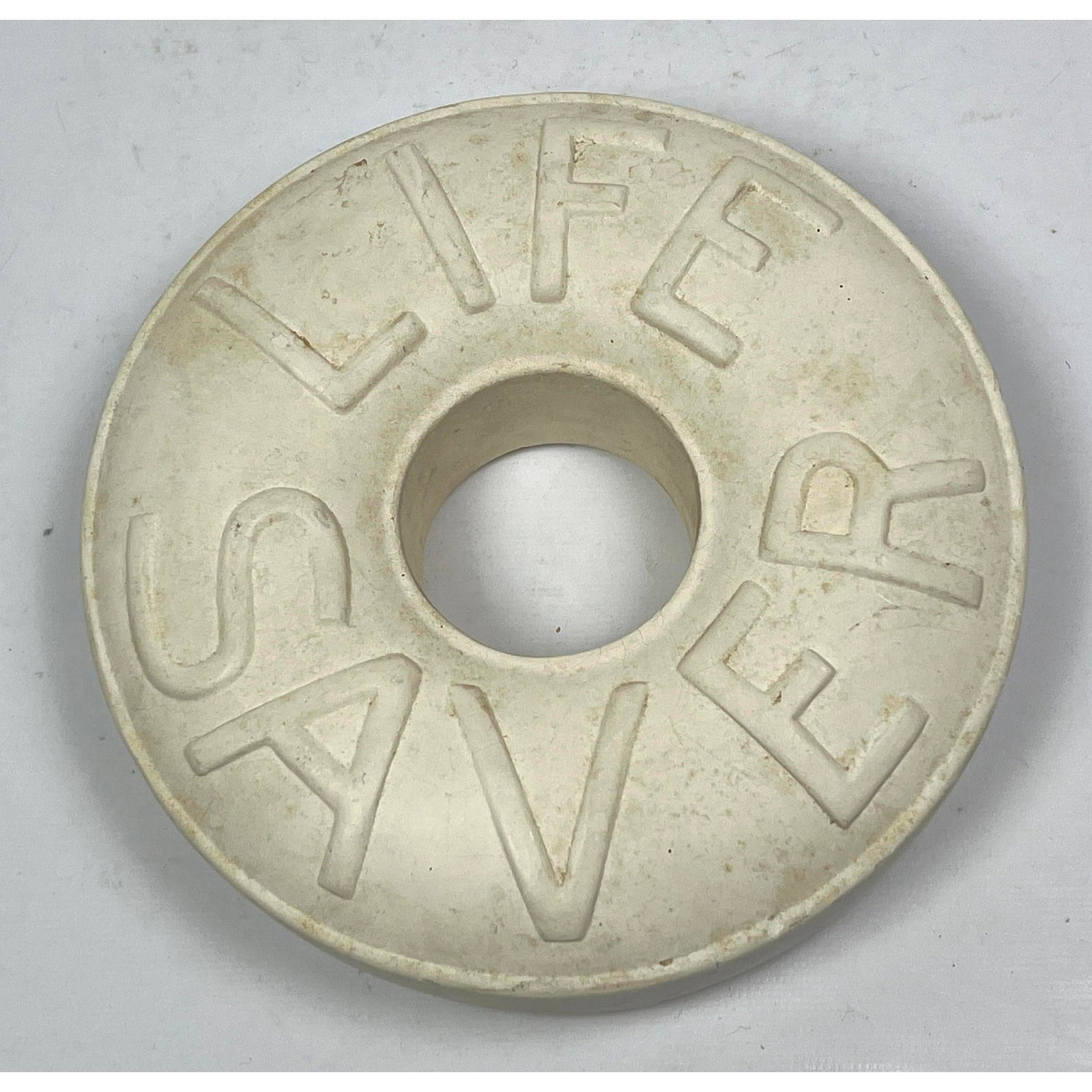 Think Big Plaster Large Lifesaver Paperweight.: Think Big Plaster Large Lifesaver Paperweight. Dimensions: Height: 7 inches, Width: 7 inches, Depth: 2 inches. --- US Packing and Shipping charge: In house shipping available. Will be calculated once