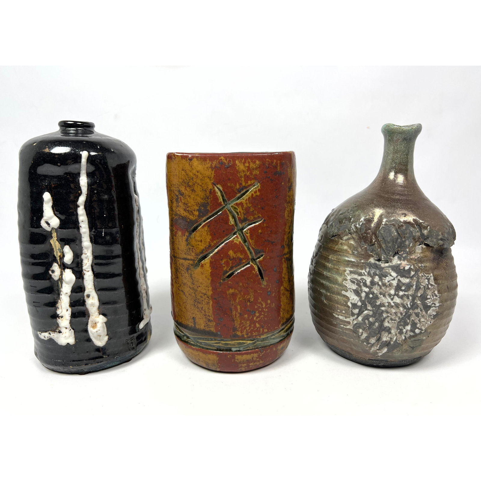 3pc Collection Mid century studio pottery Vases. All glazed. Some with incised design. Some signed. (1 of 15)