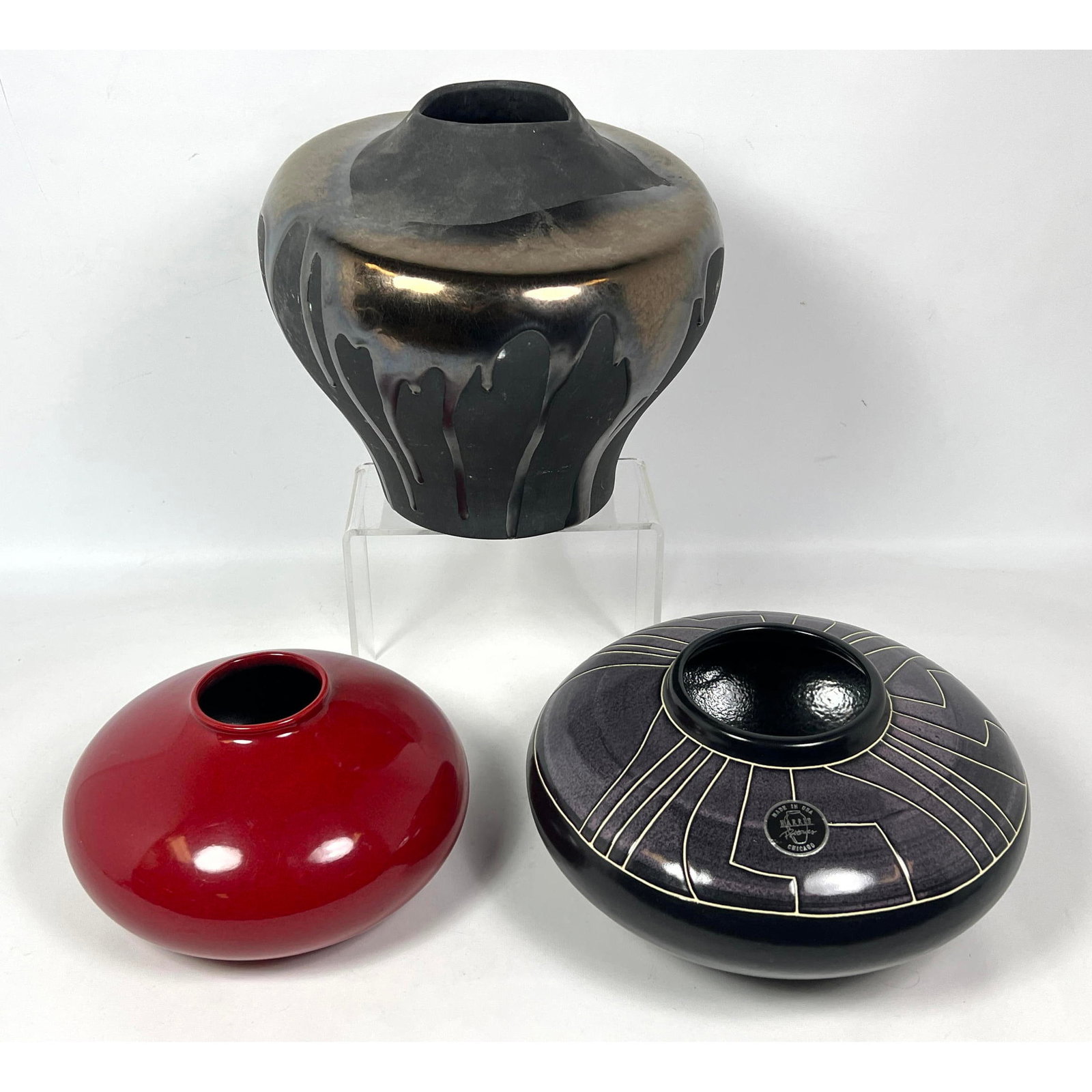 3pc Modern Pottery Vases. 1). AMANI Germany. 2). HARRIS POTTERS Chicago. 3) HAEGER. All marked.: 3pc Modern Pottery Vases. 1). AMANI Germany. 2). HARRIS POTTERS Chicago. 3) HAEGER. All marked. Dimensions: Height: 10.5 inches, Width: 11.5 inches, Depth: 11.5 inches. ---