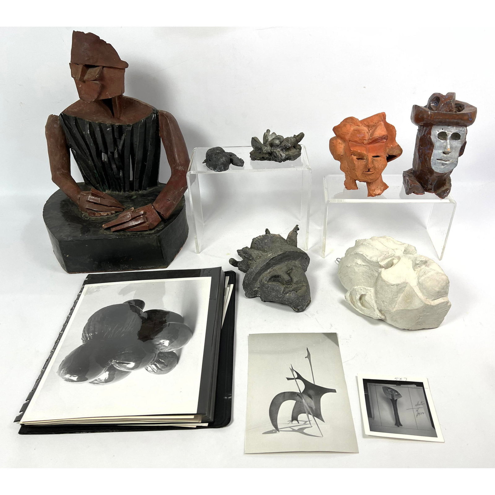 Peter Paone sculptures Lot. 3 are lead metal. 1 plaster. 3 terracotta.: Peter Paone sculptures Lot. 3 are lead metal. 1 plaster. 3 terracotta. Dimensions: Height: 14.5 inches, Width: 10.5 inches, Depth: 8.5 inches. ---