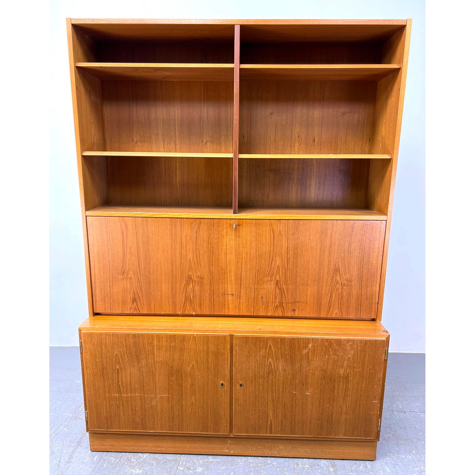 Carlo Jensen for Hundevad Teak Cabinet with Drop down Secretary.: Carlo Jensen for Hundevad Teak Cabinet with Drop down Secretary. Dimensions: Height: 78 inches, Width: 54.5 inches, Depth: 17 inches. --- We offer curbside delivery to NYC, Manhattan, Close Brooklyn, 