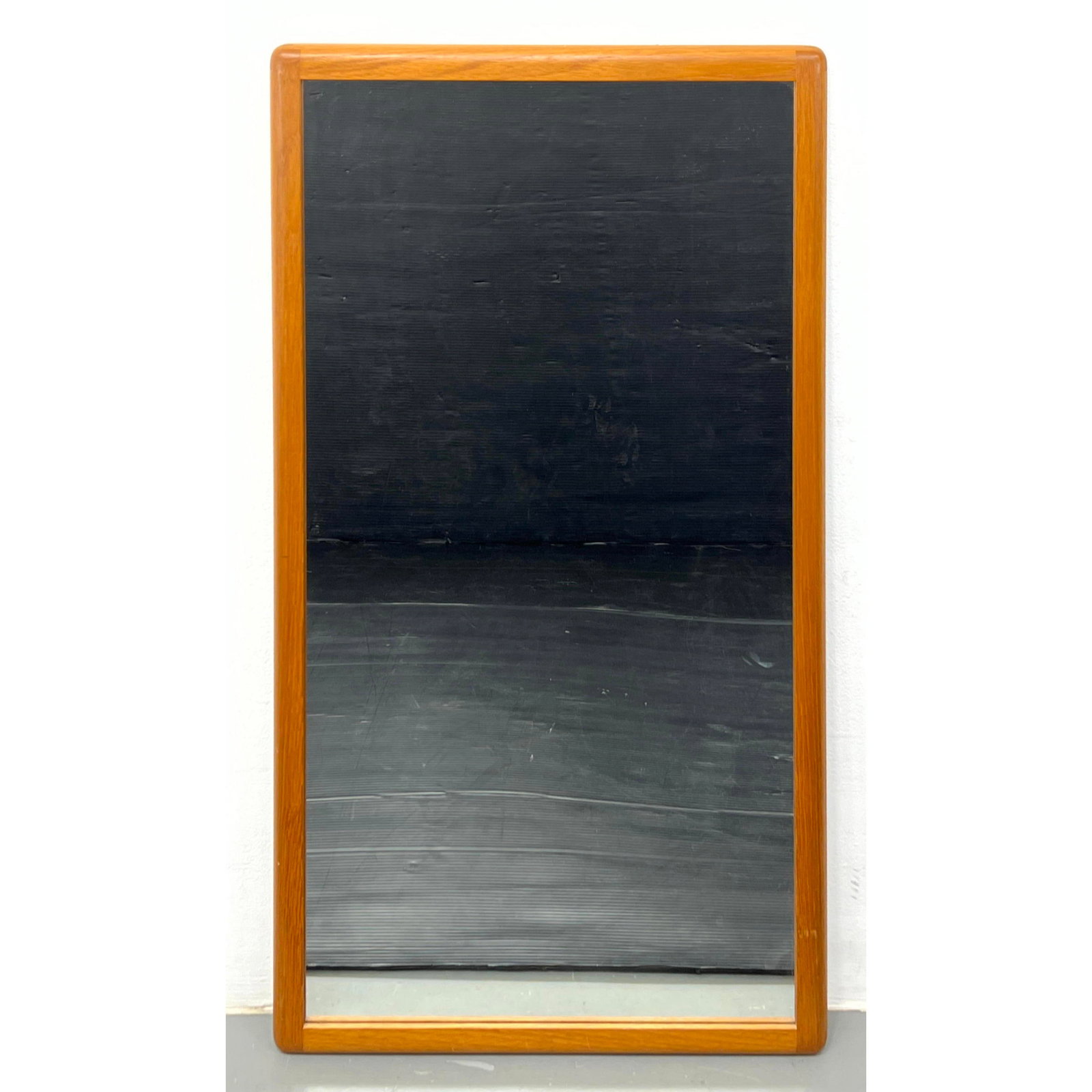 Danish Modern Teak Nordisk Andels Wall Mirror.: Danish Modern Teak Nordisk Andels Wall Mirror. Dimensions: Height: 40 inches, Width: 22.5 inches. --- We offer curbside delivery to NYC, Manhattan, Close Brooklyn, Hoboken about a week after the last 