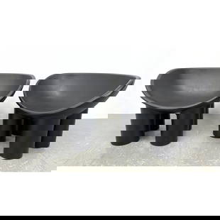 Pr Roly Poly Molded Plastic Lounge Chairs. Black seat with four thick column legs. Faye Toogood Roly: Pr Roly Poly Molded Plastic Lounge Chairs. Black seat with four thick column legs. Faye Toogood Roly Unmarked. Dimensions: Height: 24 inches, Width: 33 inches, Depth: 22 inches. - Seat Height: 14.5 in