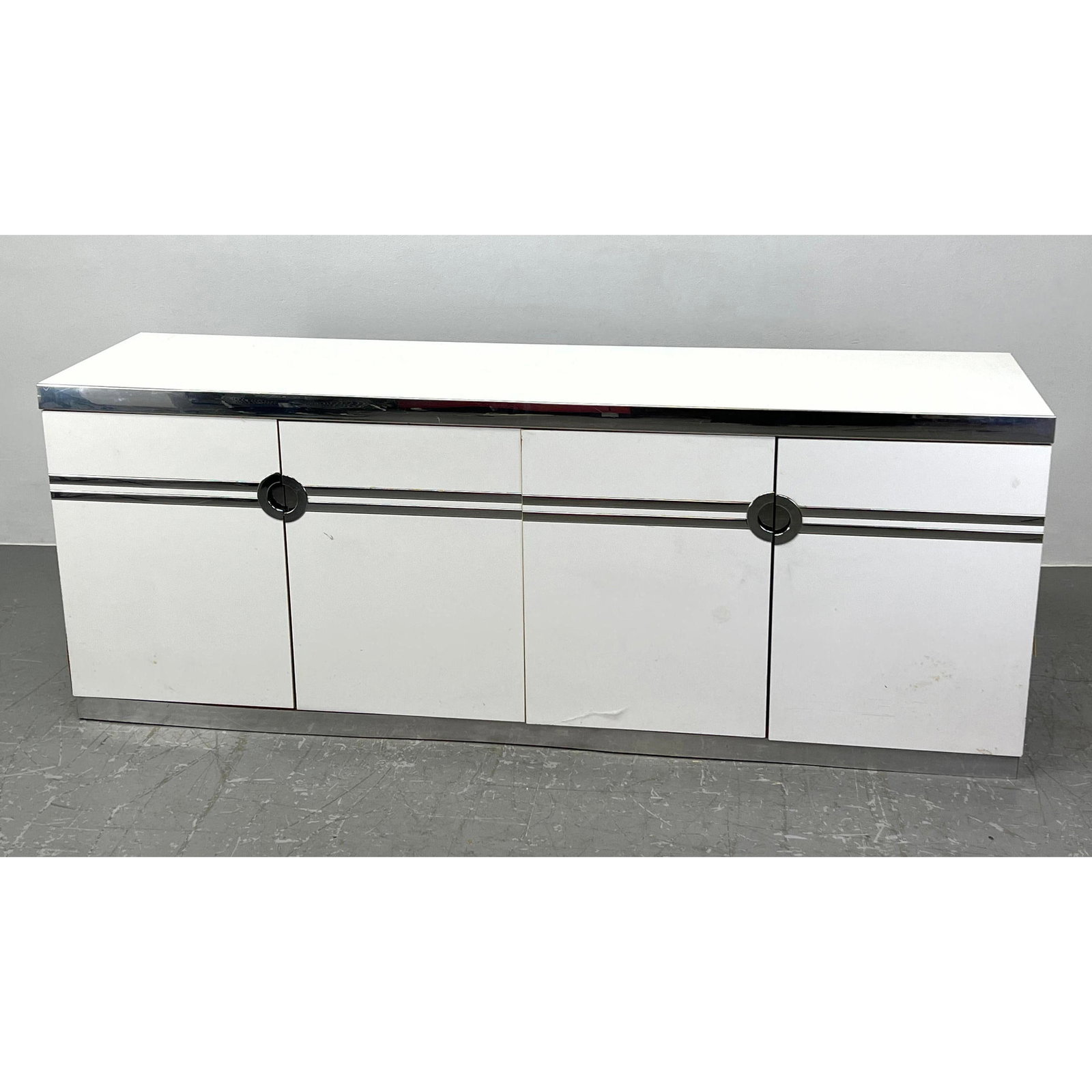 PIERRE CARDIN White Laminate Chrome Trim Credenza Sideboard. Four doors with chrome trim and pulls. (1 of 12)
