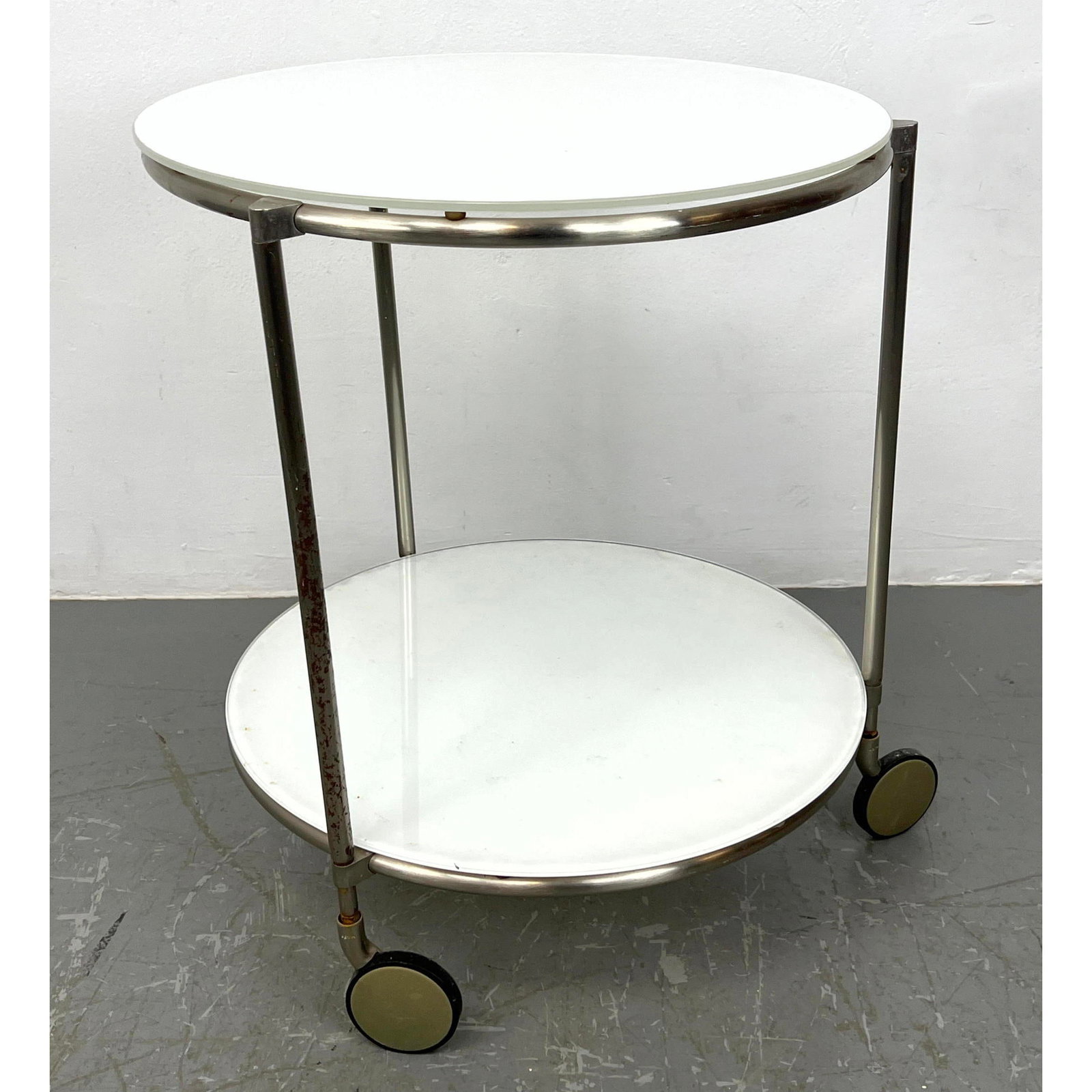 double tier Round Modernist Rolling Table. Two Milk Glass Levels in chrome tube frame. (1 of 10)