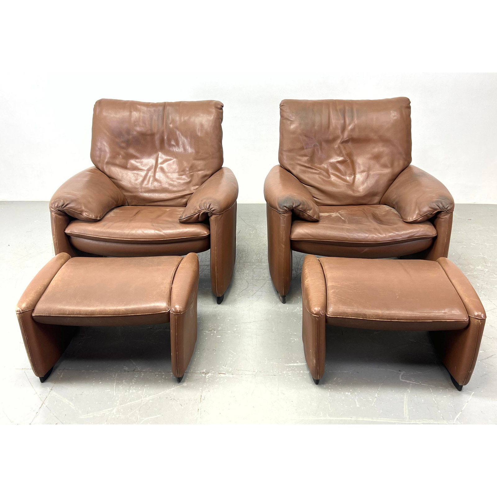Pair French LEOLUX Brown Leather Lounge chairs with matching ottomans. (1 of 14)