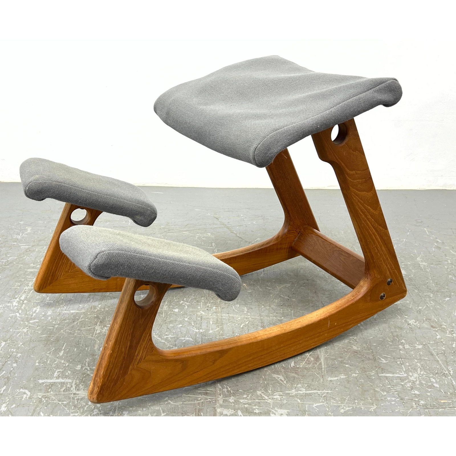 Danish Modern Teak Ergonomic Rocking Stool: Danish Modern Teak Ergonomic Rocking Stool Dimensions: Height: 20 inches, Width: 19.5 inches, Depth: 28 inches. --- We offer curbside delivery to NYC, Manhattan, Close Brooklyn, Hoboken about a week a