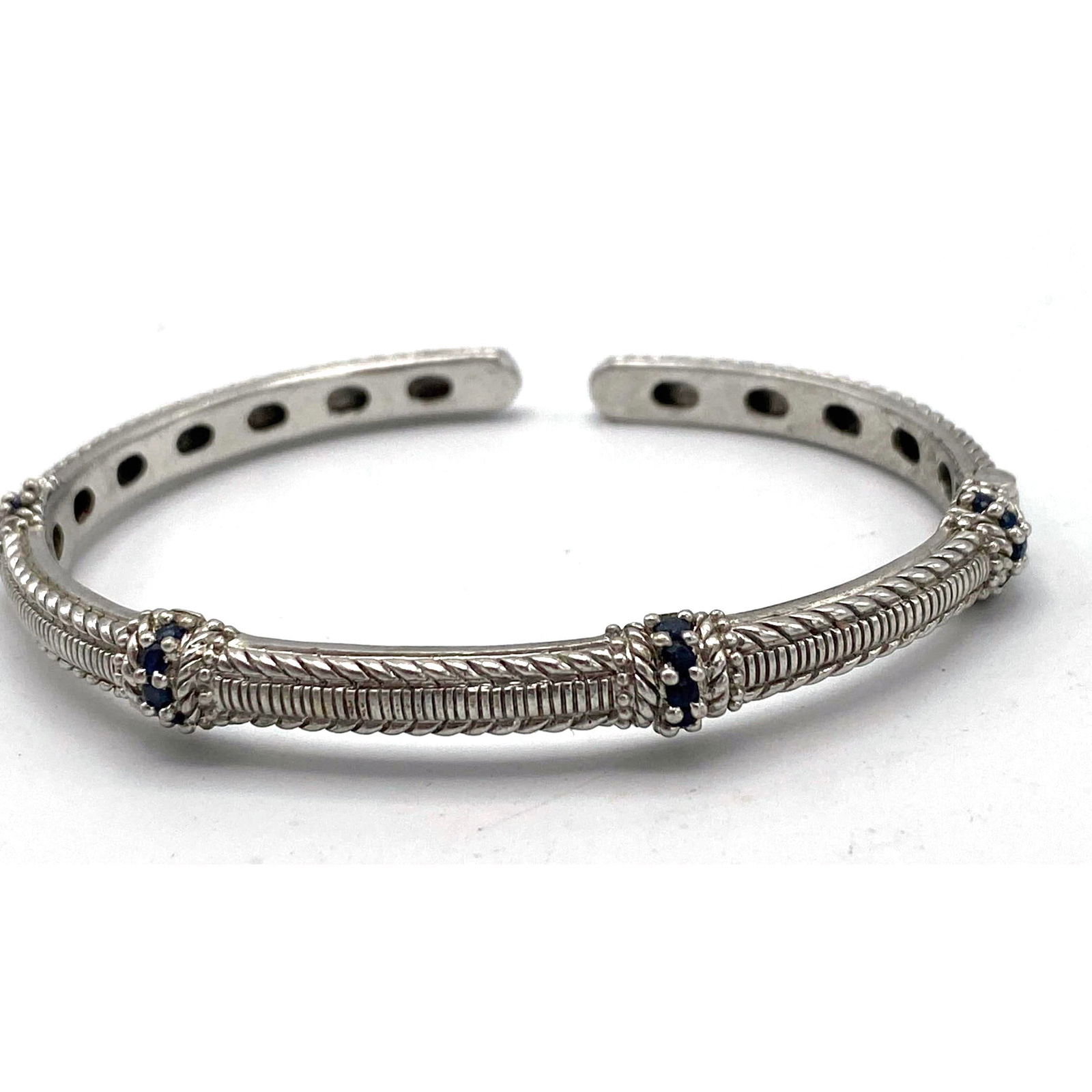 JUDITH RIPKA Sterling Silver Sapphire Cuff Bracelet. Hinged bracelet with blue sapphire details. Cab (1 of 9)