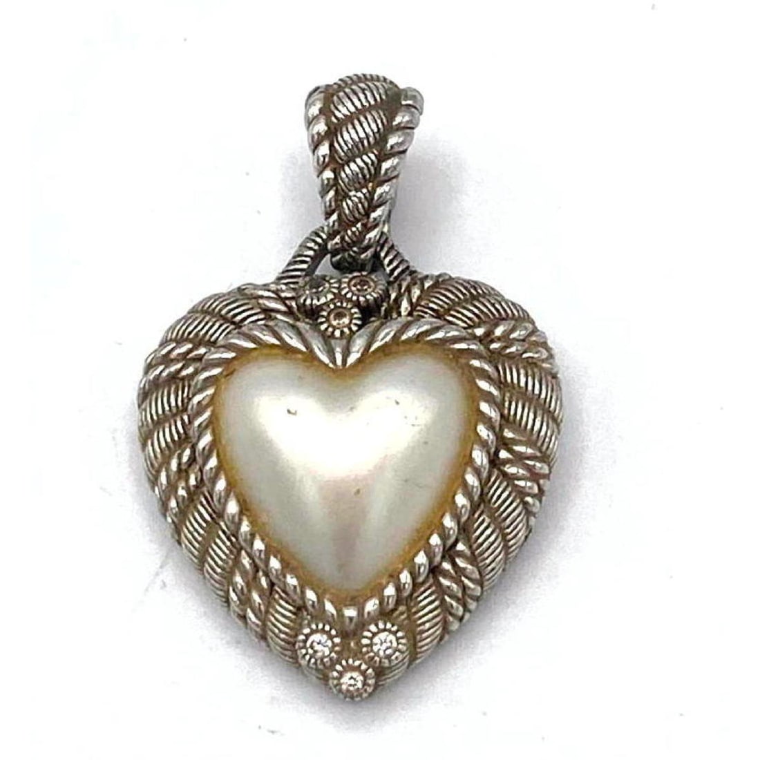 JUDITH RIPKA Sterling  Pearlized Heart pendant..  Framed with tiny CZs. Marked (1 of 5)