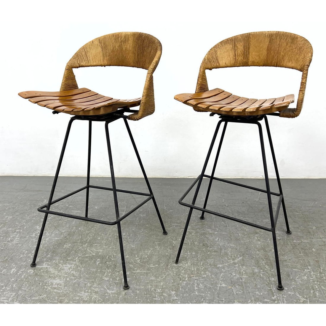 Pair Arthur Umanoff bar stools.  Slat seat with woven back. (1 of 13)