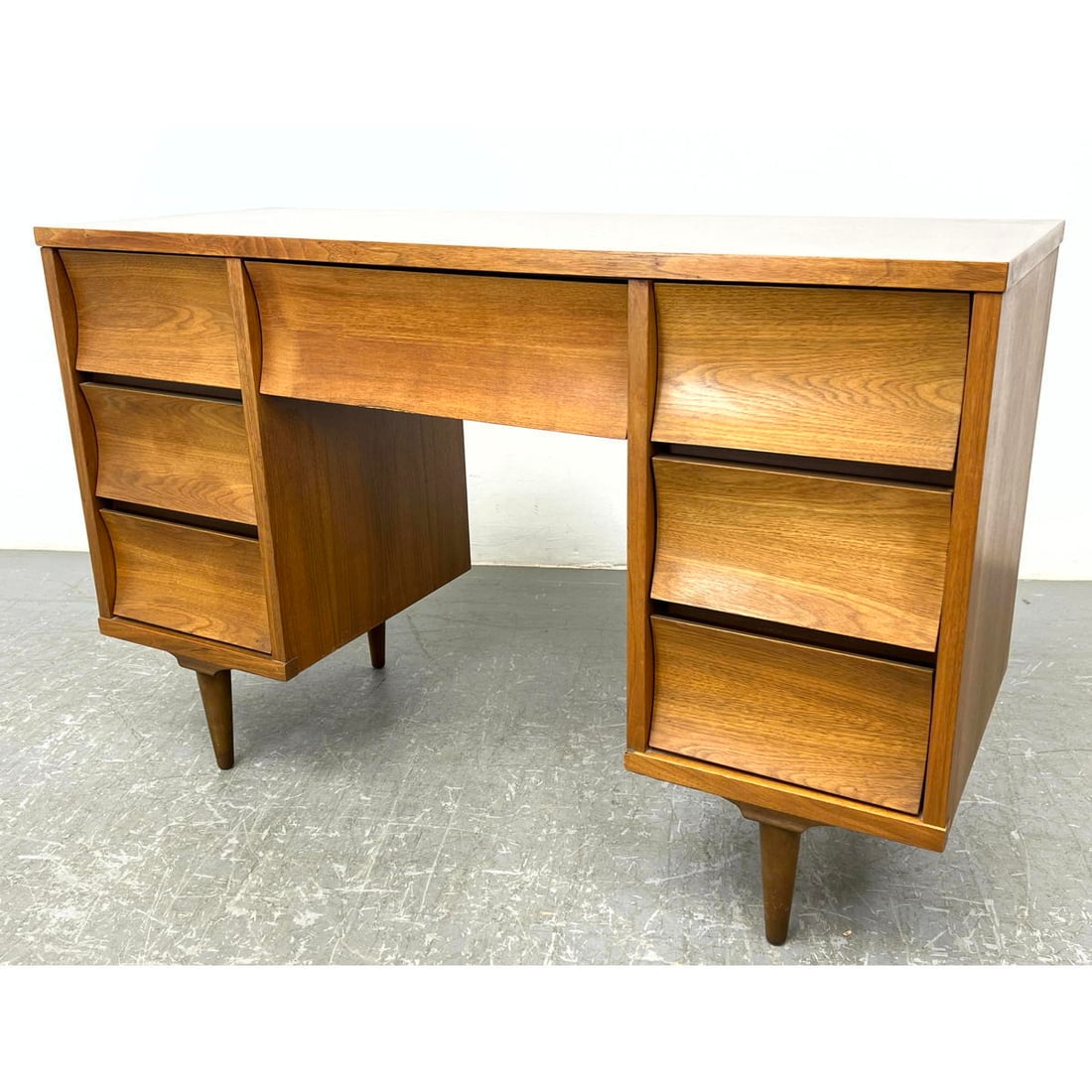 American Modern Walnut Desk. WFH. Modernist concave drawer fronts. Laminated top. (1 of 8)