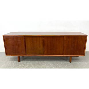 A Gunni Omann teak credenza for Axel Christensen. Danish Modern Sideboard.: A Gunni Omann teak credenza for Axel Christensen. Danish Modern Sideboard. Dimensions: Height: 30 inches, Width: 79 inches, Depth: 18.5 inches. ---