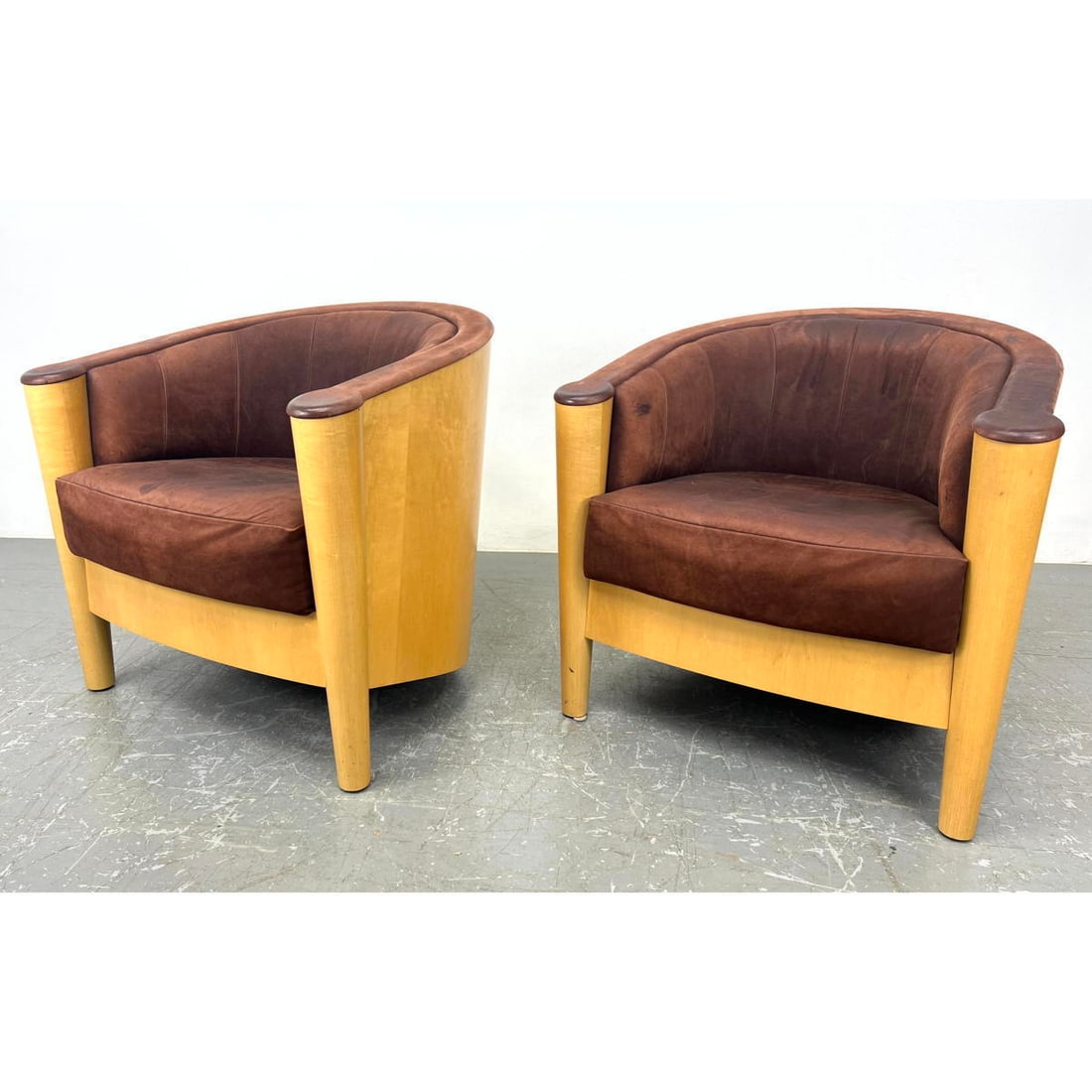 Pair Art Deco Philippe Starck Style Lounge Chairs. Curved wood back and leather upholstery.: Pair Art Deco Philippe Starck Style Lounge Chairs. Curved wood back and leather upholstery. Dimensions: Height: 30 inches, Width: 30.25 inches, Depth: 28 inches. - Seat Height: 18 inches ---