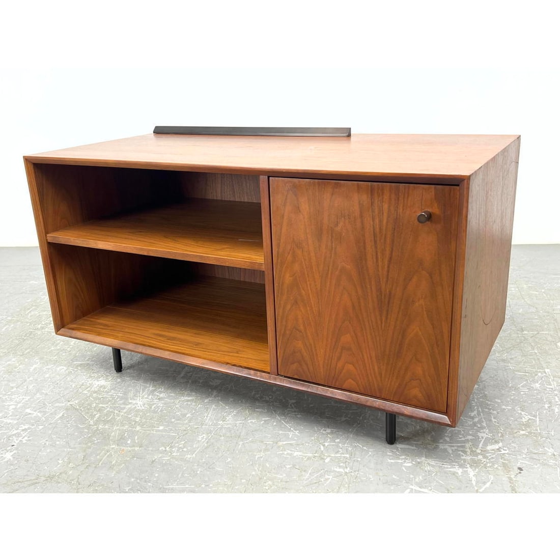 Mid Century Modern Cabinet with One Door. Raised on black metal tube base. (1 of 10)
