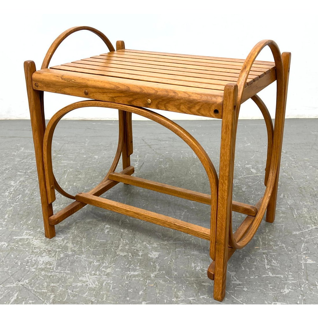Modernist Slat Bench with Bentwood Frame. Adirondack Style: Modernist Slat Bench with Bentwood Frame. Adirondack Style Dimensions: Height: 22 inches, Width: 23 inches, Depth: 17 inches. ---