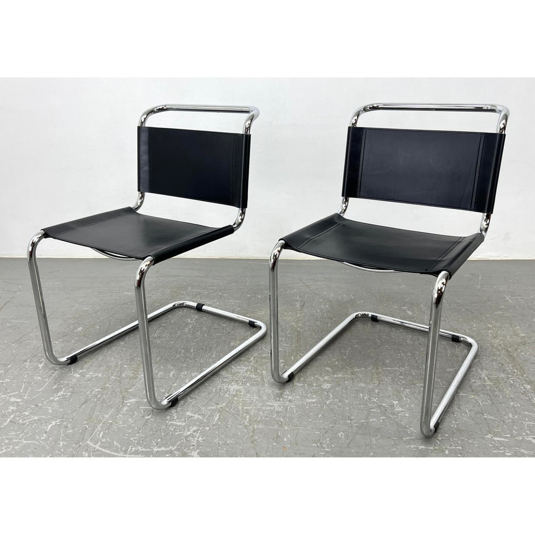 Mart Stam Cantilever Chair Black Leather and Chrome: Mart Stam Cantilever Chair Black Leather and Chrome Dimensions: Height: 32.25 inches, Width: 19 inches, Depth: 25.5 inches. - Seat Height: 17.75 inches ---