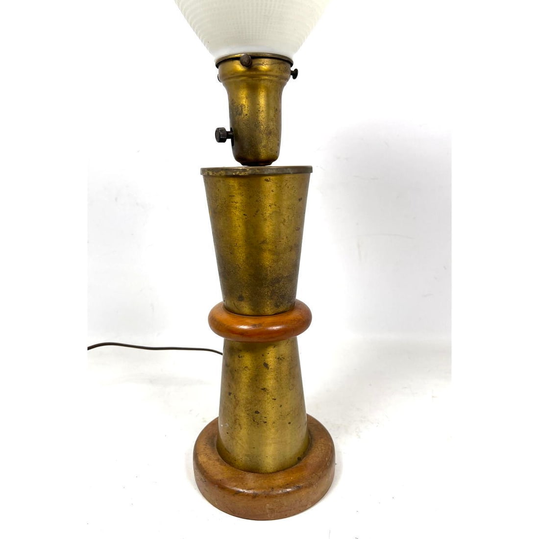 Aluminum and Wood Lamp. Corseted form. In the manner of Russel Wright.: Aluminum and Wood Lamp. Corseted form. In the manner of Russel Wright. Dimensions: Height: 21 inches, Width: 6 inches, Depth: 6 inches. ---