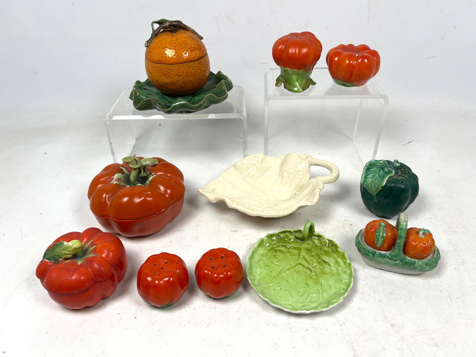 Collection of Figural Tomato and Lettuce Table Accessories. Orange and tomato form lidded boxes. S&P: Collection of Figural Tomato and Lettuce Table Accessories. Orange and tomato form lidded boxes. S&P Shakers. Dimensions: Height: 4 inches, Width: 5.5 inches, Depth: 5.5 inches. --- US Packing and Shi