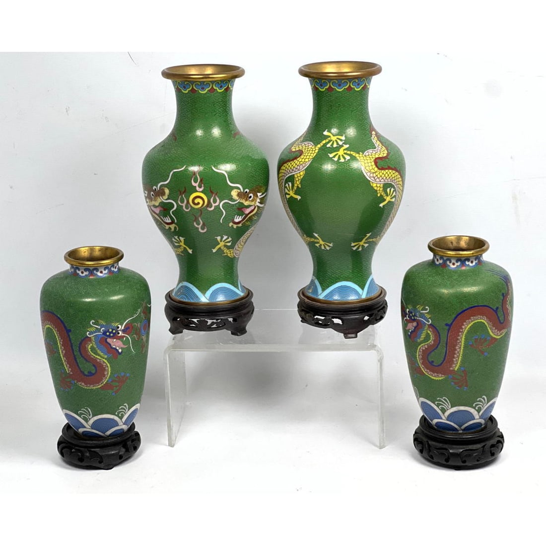 Lot 4 Cloisonne vases with 5 toe dragon decoration. Wood bases.: Lot 4 Cloisonne vases with 5 toe dragon decoration. Wood bases. Dimensions: Height: 9 inches, Width: 5 inches, Depth: 5 inches. --- US Packing and Shipping charge: In house shipping available. Will be