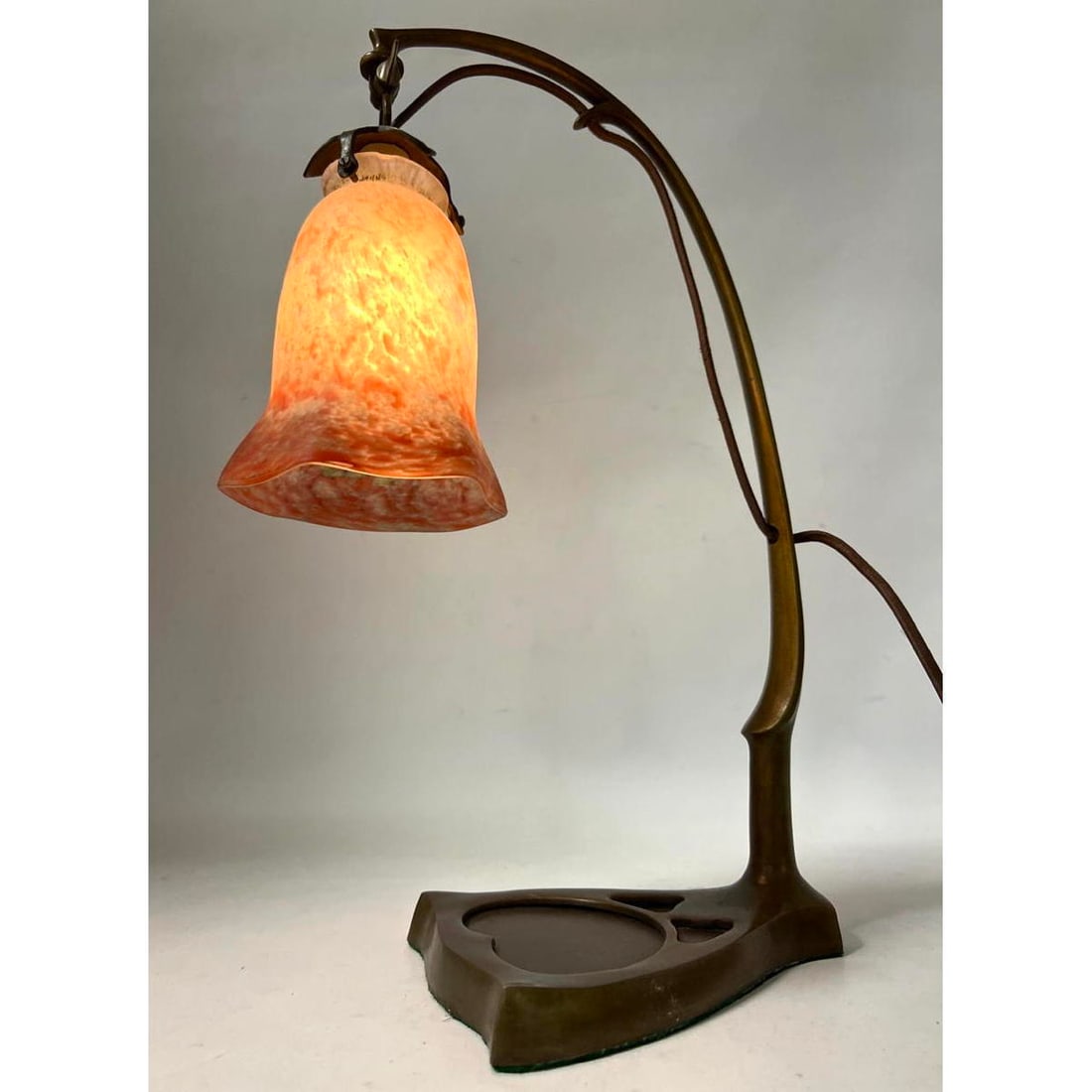 Art Nouveau Style Bronze and Glass Table Lamp.: Art Nouveau Style Bronze and Glass Table Lamp. Dimensions: Height: 16 inches, Width: 5.5 inches, Depth: 12.5 inches. --- US Packing and Shipping charge: In house shipping available. Will be calculated