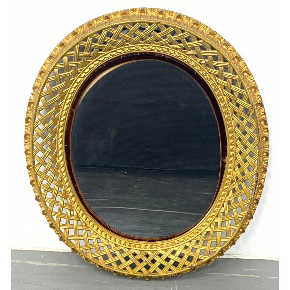 Gilt Metal Wall Mirror.  Wide basket weave Metal Frame.  Oval Mirror.  Spot of loss to metal on side (1 of 8)