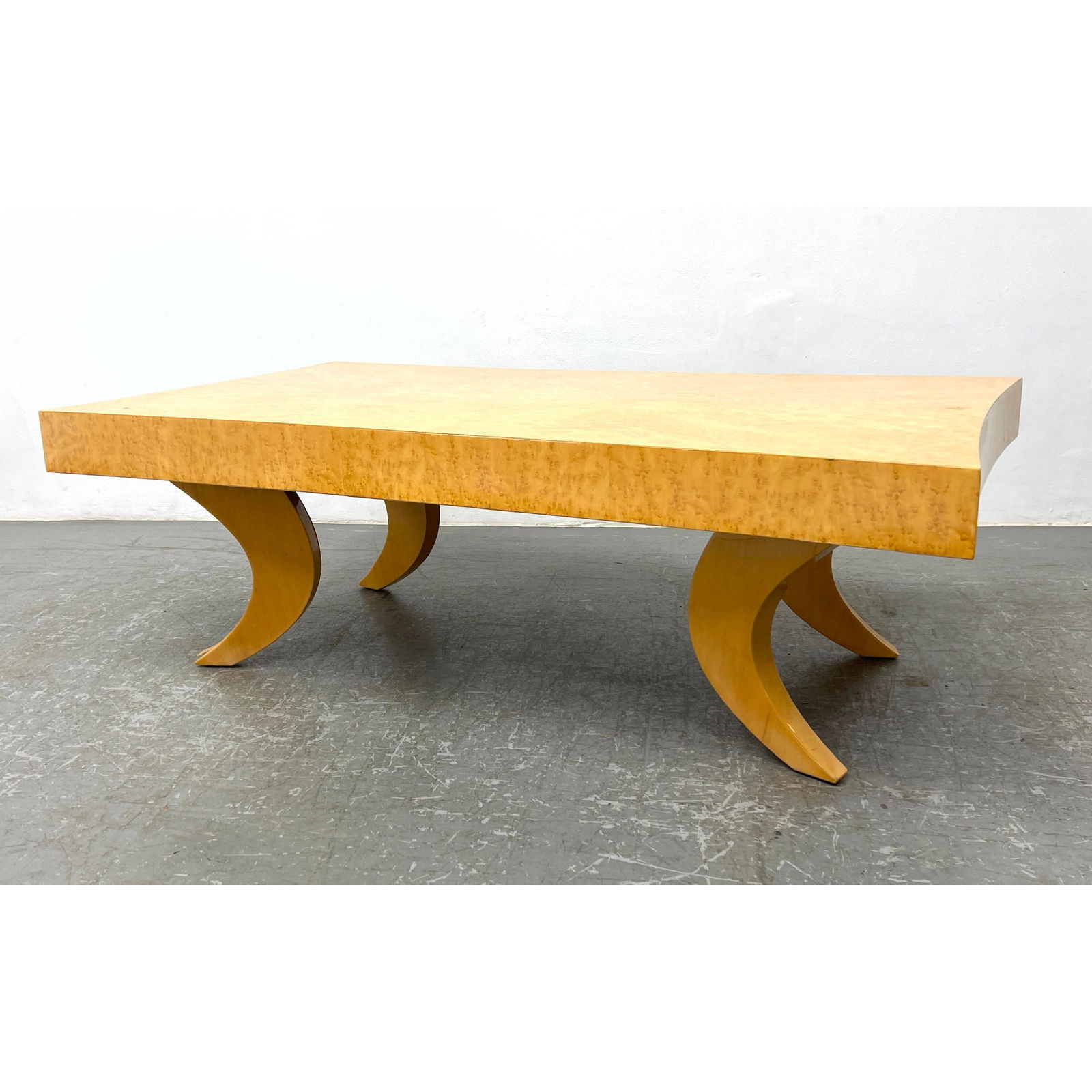 Unusual Maple Modernist Coffee Table. Flared Splayed Horn Shaped Legs. No marks found.: Unusual Maple Modernist Coffee Table. Flared Splayed Horn Shaped Legs. No marks found. Dimensions: Height: 18 inches, Width: 54 inches, Depth: 30 inches. --- - - We offer curbside delivery to NYC, Man