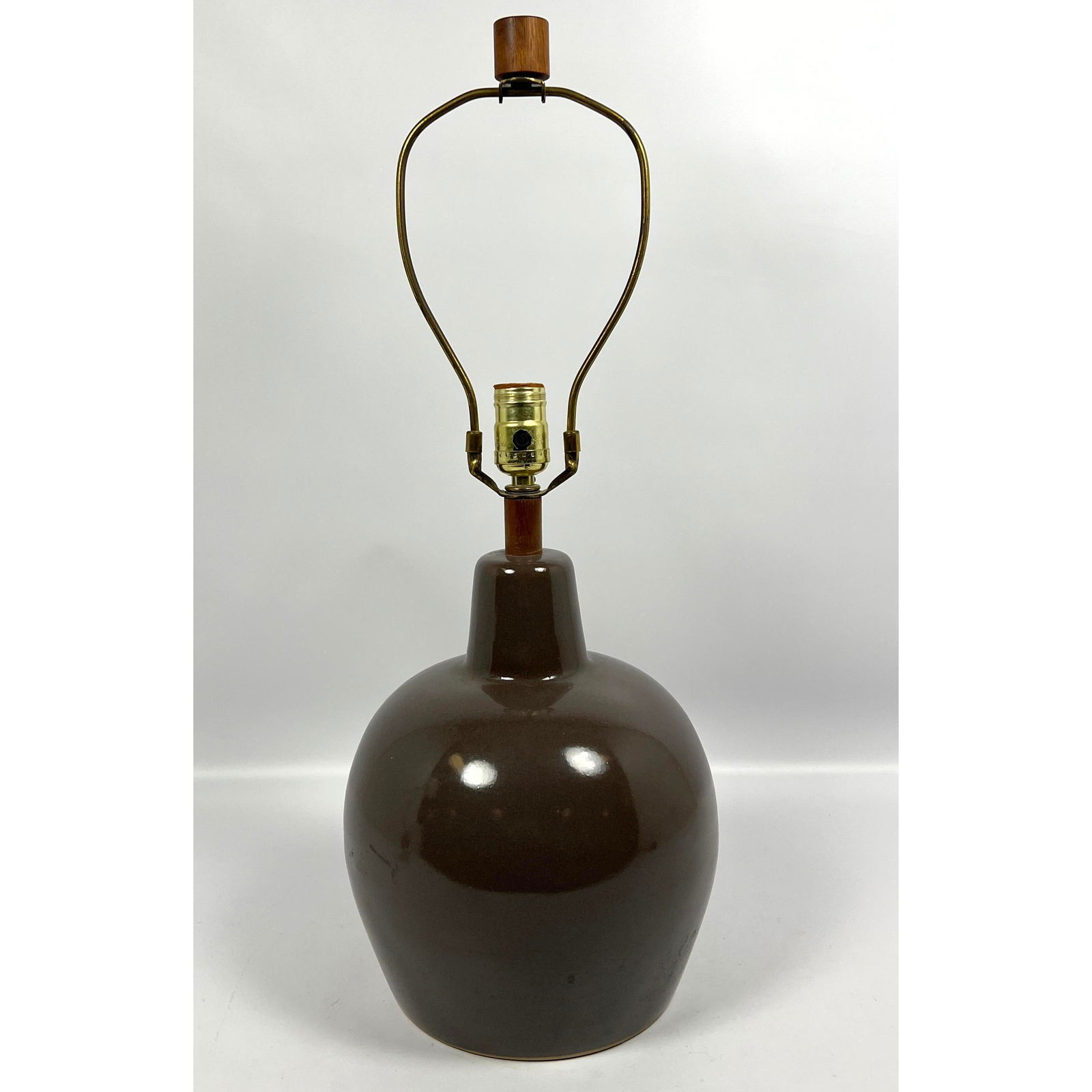 Gordon and Jane Martz for Marshall Studios Brown Lamp with Original Walnut Finial. Signed by Cord an: Gordon and Jane Martz for Marshall Studios Brown Lamp with Original Walnut Finial. Signed by Cord and original sticker Dimensions: Height: 24 inches, Width: 9 inches, Depth: 9 inches. --- - - We offer