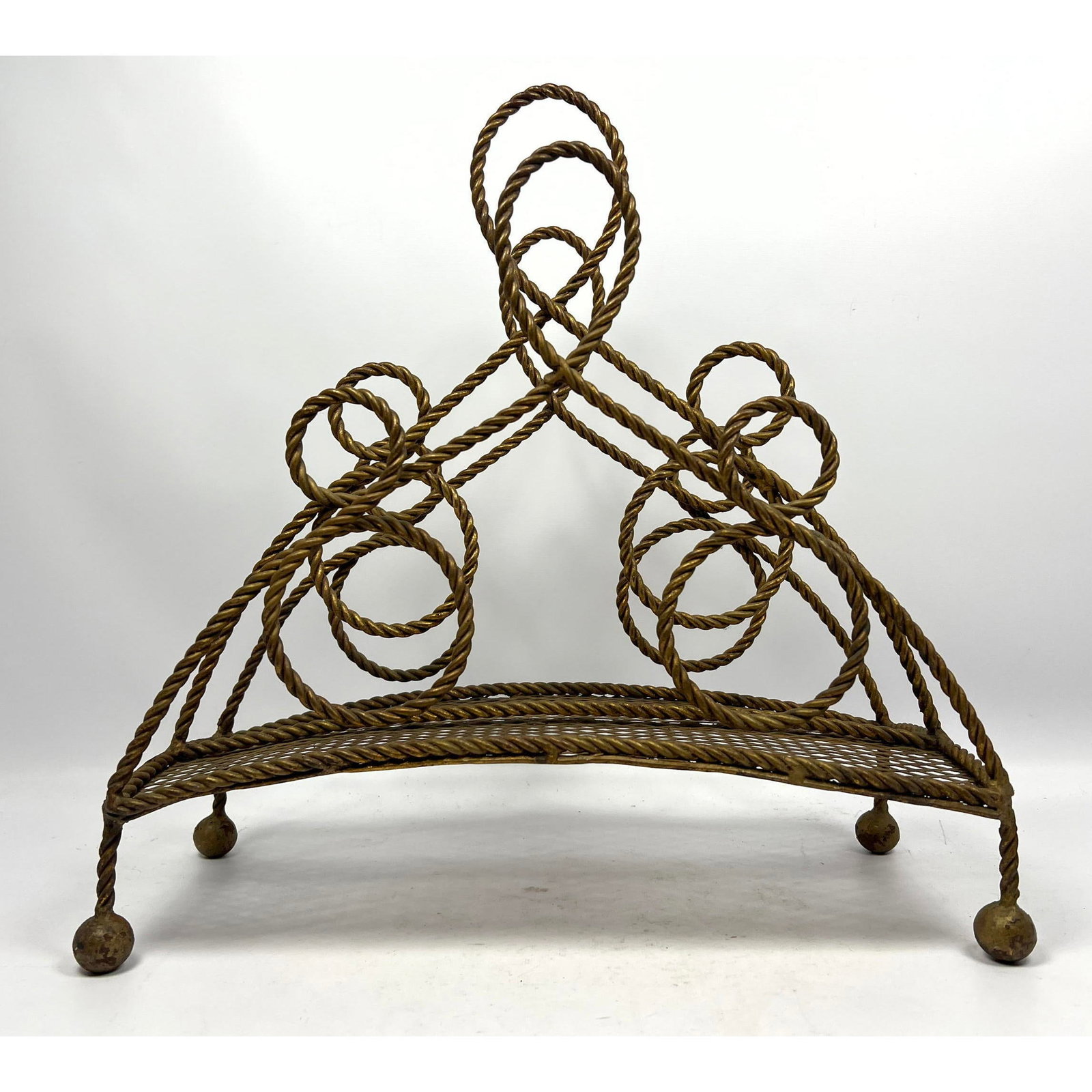 Twisted Metal Rope form Magazine Rack Designer Modernist. Italian.: Twisted Metal Rope form Magazine Rack Designer Modernist. Italian. Dimensions: Height: 19 inches, Width: 18 inches, Depth: 7.75 inches. --- - - We offer curbside delivery to NYC, Manhattan, Close Broo