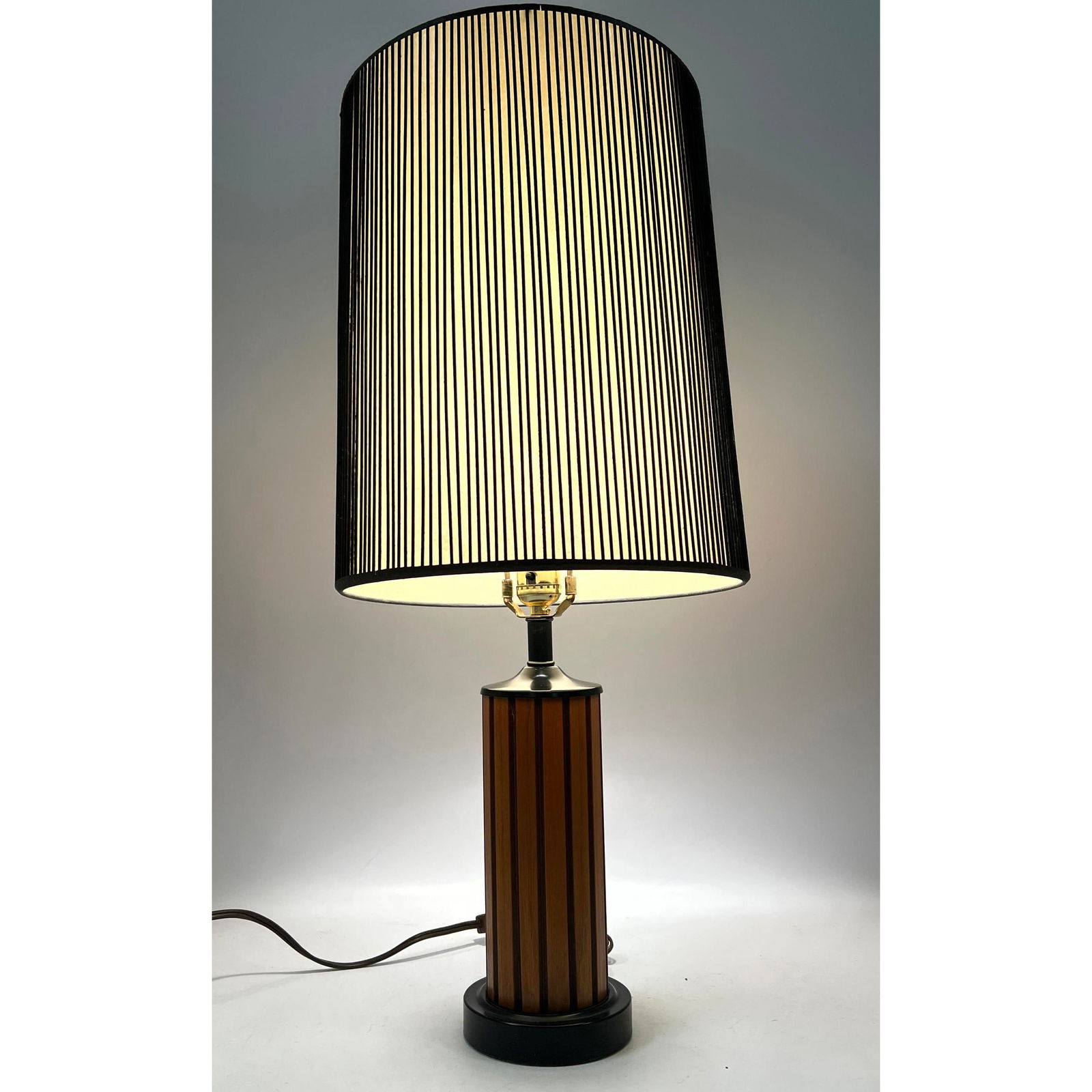 1950s Groove Wood Table Lamp with Original Shade: 1950s Groove Wood Table Lamp with Original Shade Dimensions: Height: 28 inches, Width: 11.25 inches, Depth: 11.25 inches. --- - - We offer curbside delivery to NYC, Manhattan, Close Brooklyn, Hoboken