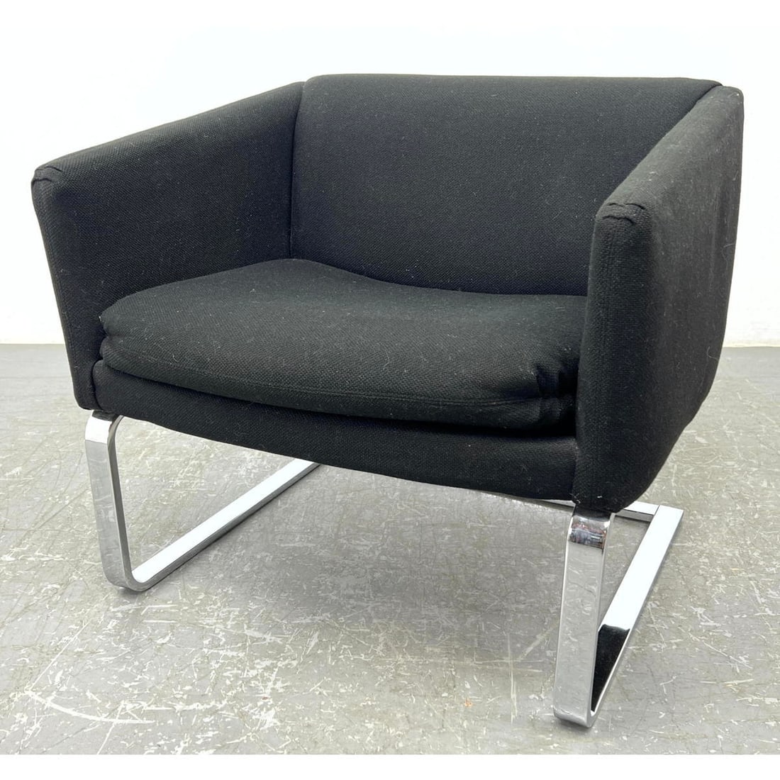 SELIG Imperial Modernist Lounge Chair. Cube form chair with cushion seat. Wide flat chromed steel le: SELIG Imperial Modernist Lounge Chair. Cube form chair with cushion seat. Wide flat chromed steel legs: cantilever frame. Label. Dimensions: Height: 26.5 inches, Width: 28 inches, Depth: 26 inches. -